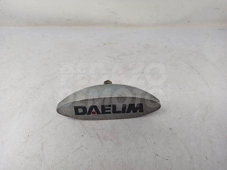 Emblema marca Daelim Daystar Carburación 125 2006 - 2009